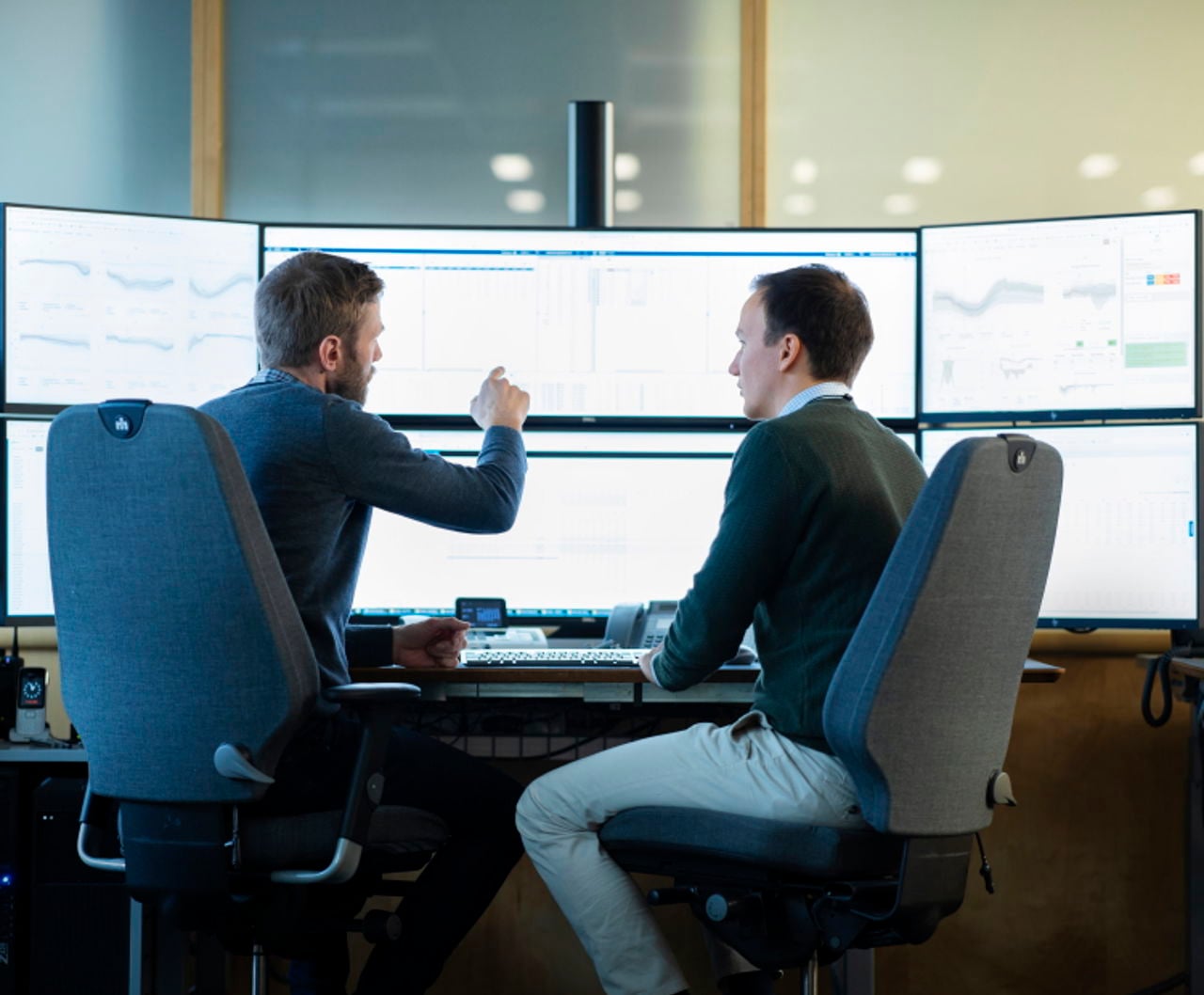 Men working with charts